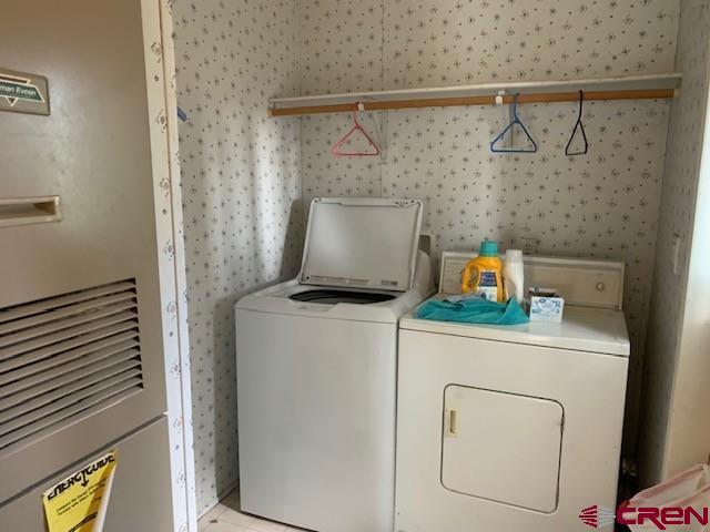 19922 Jay Road Austin, CO 81410 - Photo 9 of 14 a utility room with dryer and washer