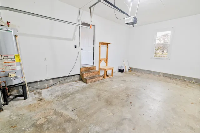 a view of entryway with stairs and wooden floor