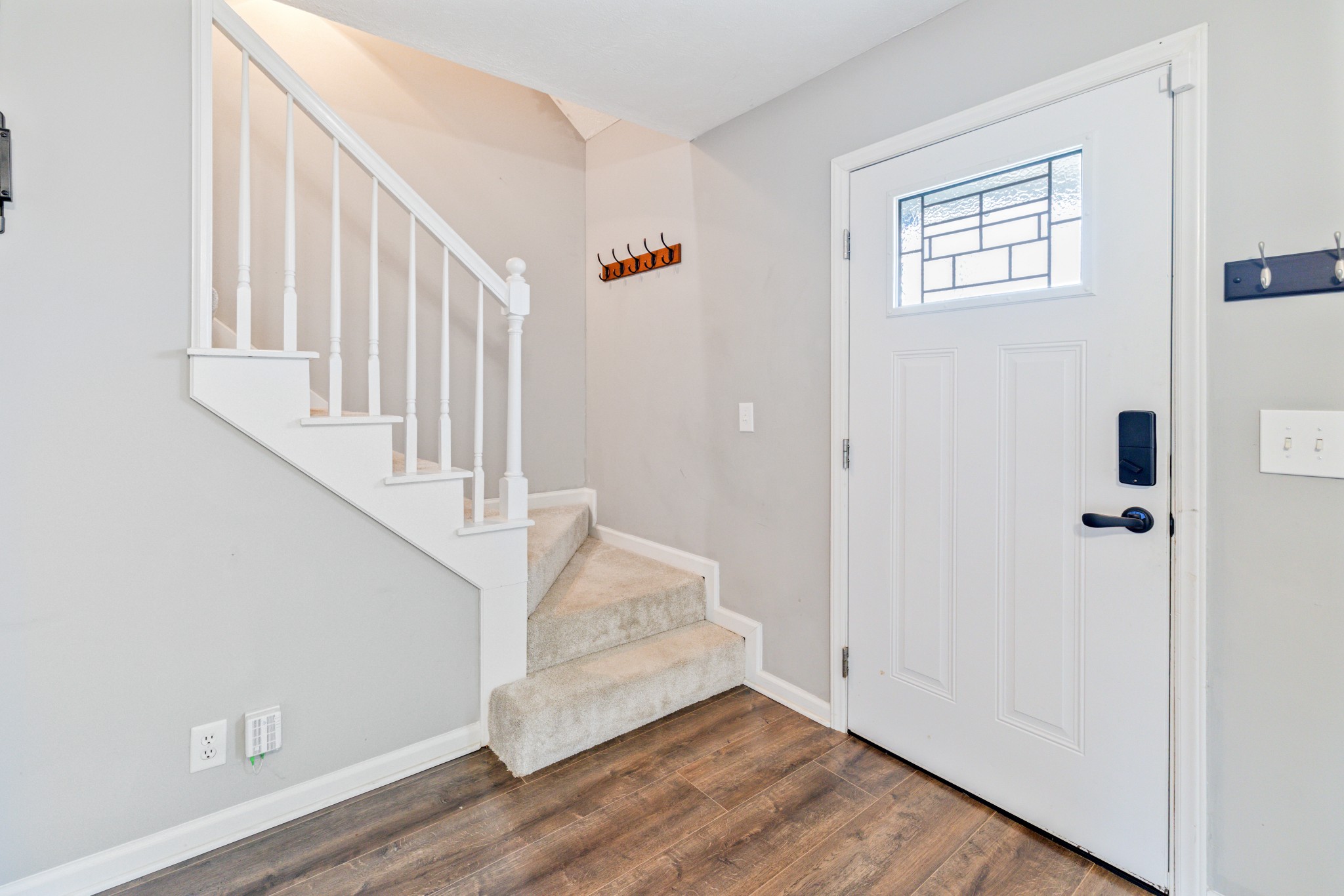 109 Lafayette Rockvale, TN 37153 - Photo 29 of 43 a view of entryway with stairs and wooden floor