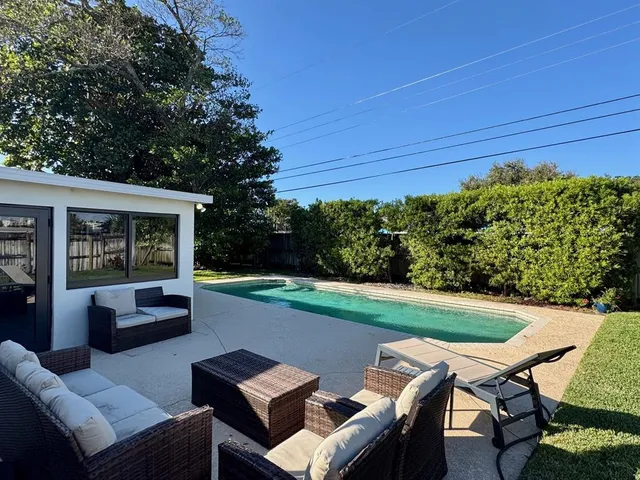 a view of a patio with open seating