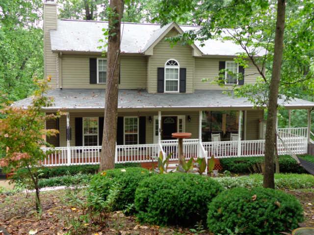 4651 Heath Road Nashville, TN 37221 - Photo 1 of 20 WELCOME HOME!! Your own private sanctuary with 5 natural acres complete with rocking chair front porch and convenient to all Nashville has to offer!!