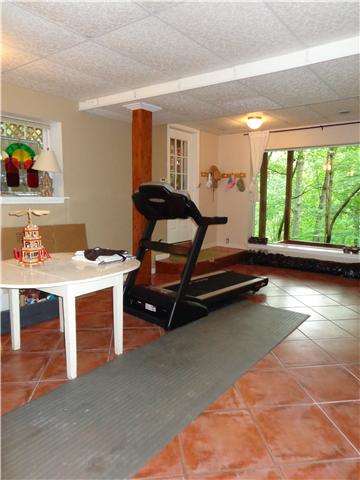 4651 Heath Road Nashville, TN 37221 - Photo 15 of 20 Spacious basement level rec room with endless possibilites!!