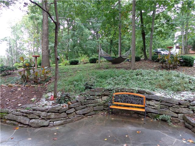 4651 Heath Road Nashville, TN 37221 - Photo 16 of 20 View of the front yard from the front porch...notice the hammock!!