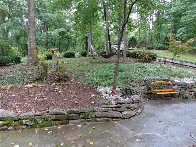 4651 Heath Road Nashville, TN 37221 - Photo 20 of 20 Thousand of perennials bloom each year!! Fire pit and perfect area for hammock to enjoy the birds and deer!! Don't miss seeing this special home!!!