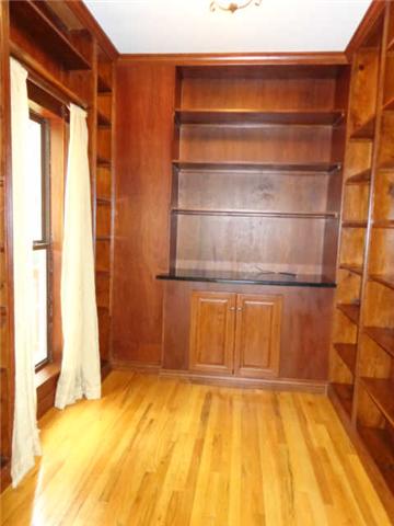 4651 Heath Road Nashville, TN 37221 - Photo 5 of 20 Library with natural wood, fantastic shelving to display books and memories