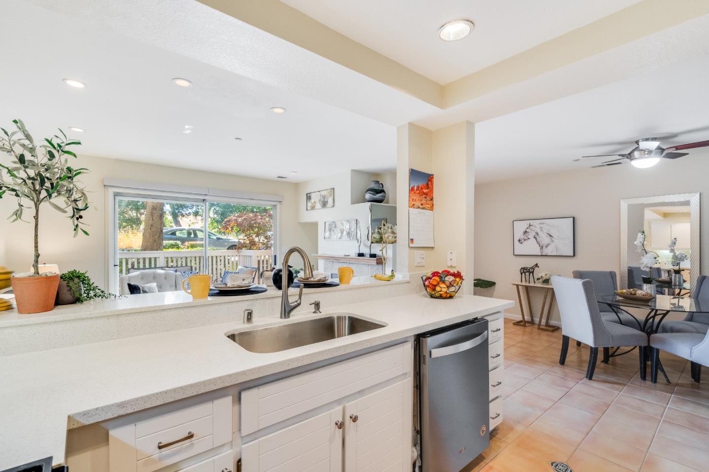6936 Gregorich Drive, Unit E San Jose, CA 95138 - Photo 11 of 44 a kitchen with a sink and lots of counter space