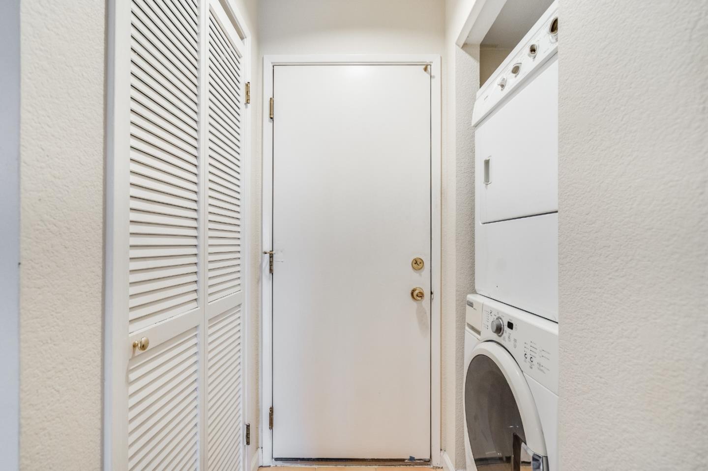 6936 Gregorich Drive, Unit E San Jose, CA 95138 - Photo 13 of 44 a view of hallway with washer and dryer