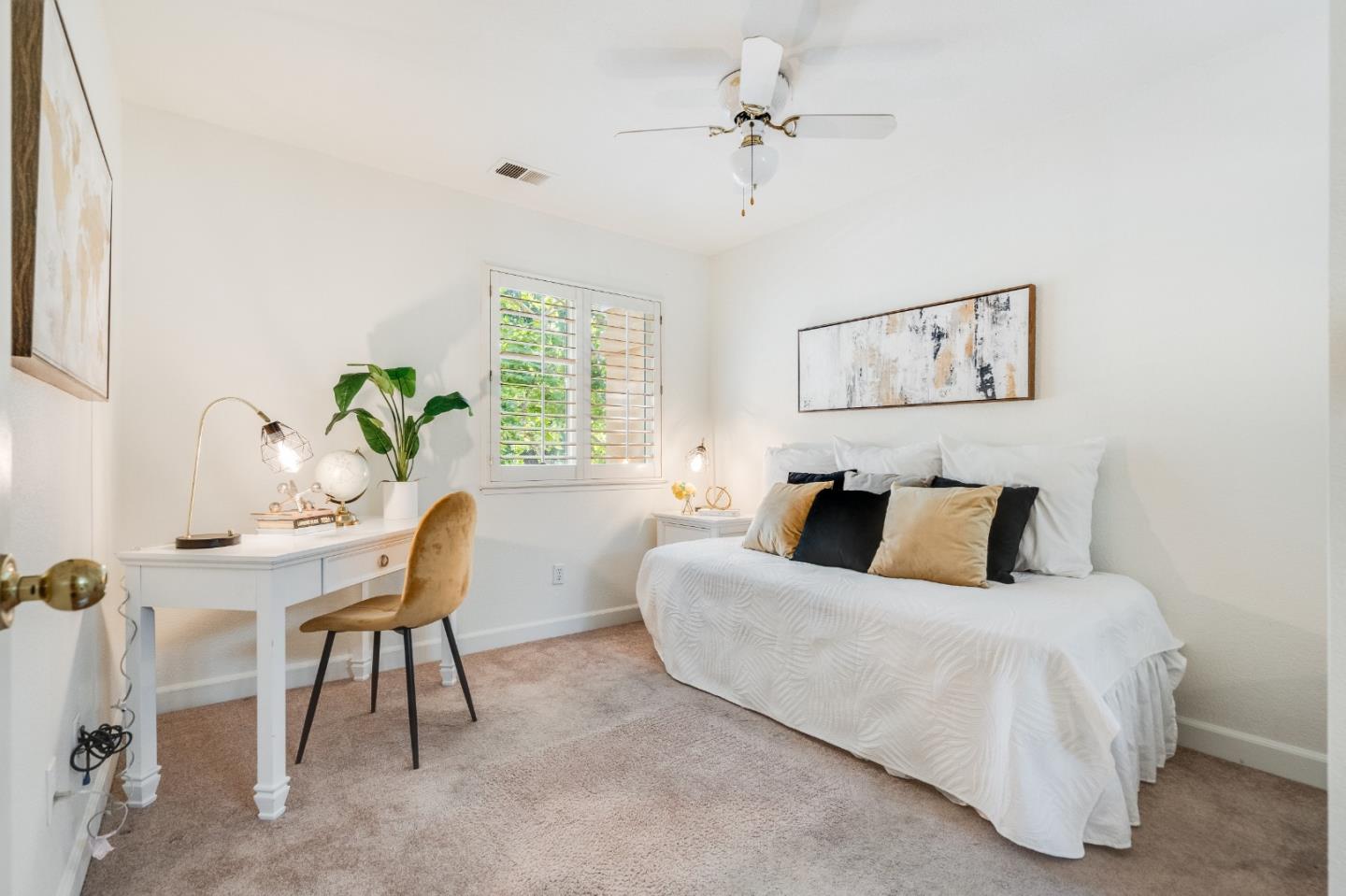 6936 Gregorich Drive, Unit E San Jose, CA 95138 - Photo 16 of 44 a bedroom with a bed and a table