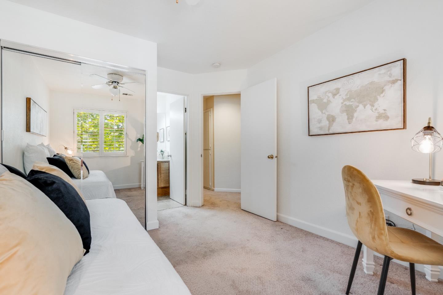 6936 Gregorich Drive, Unit E San Jose, CA 95138 - Photo 17 of 44 a bedroom with a bed and a chair