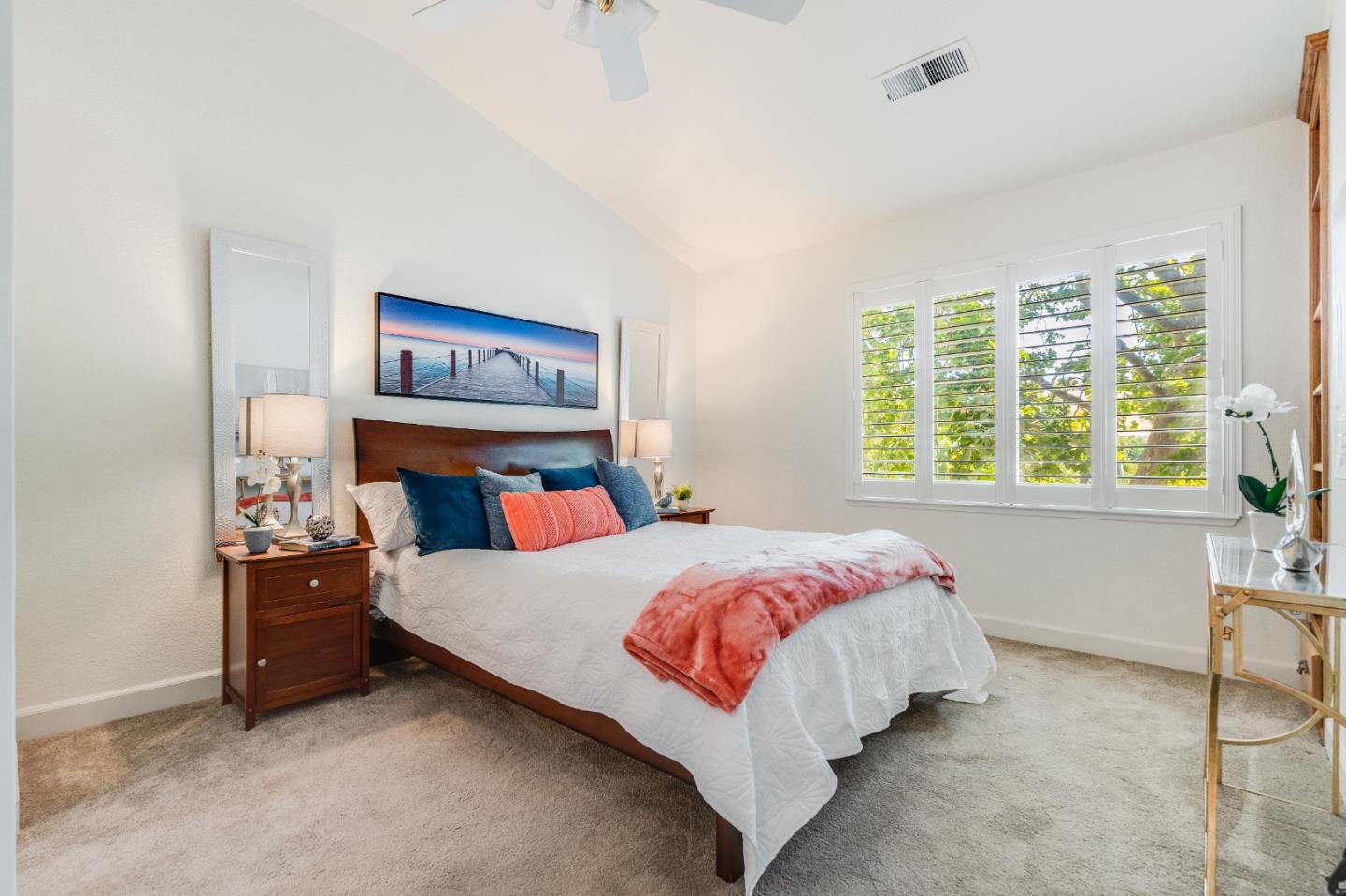 6936 Gregorich Drive, Unit E San Jose, CA 95138 - Photo 19 of 44 a bedroom with a bed and a large window