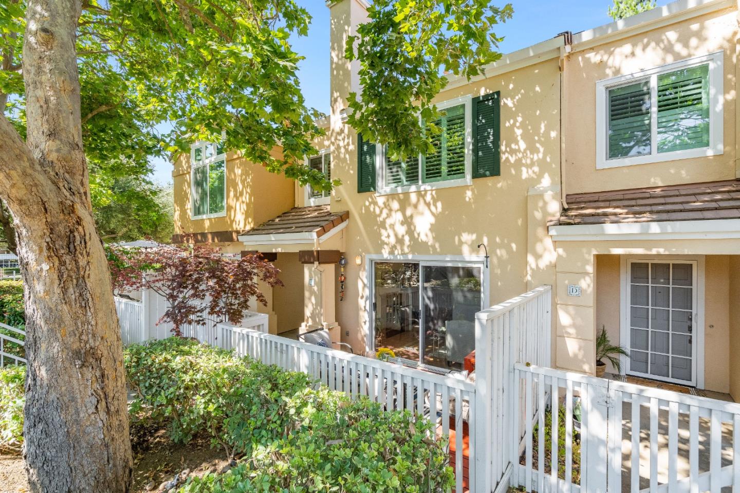 6936 Gregorich Drive, Unit E San Jose, CA 95138 - Photo 2 of 44 front view of a house with a porch