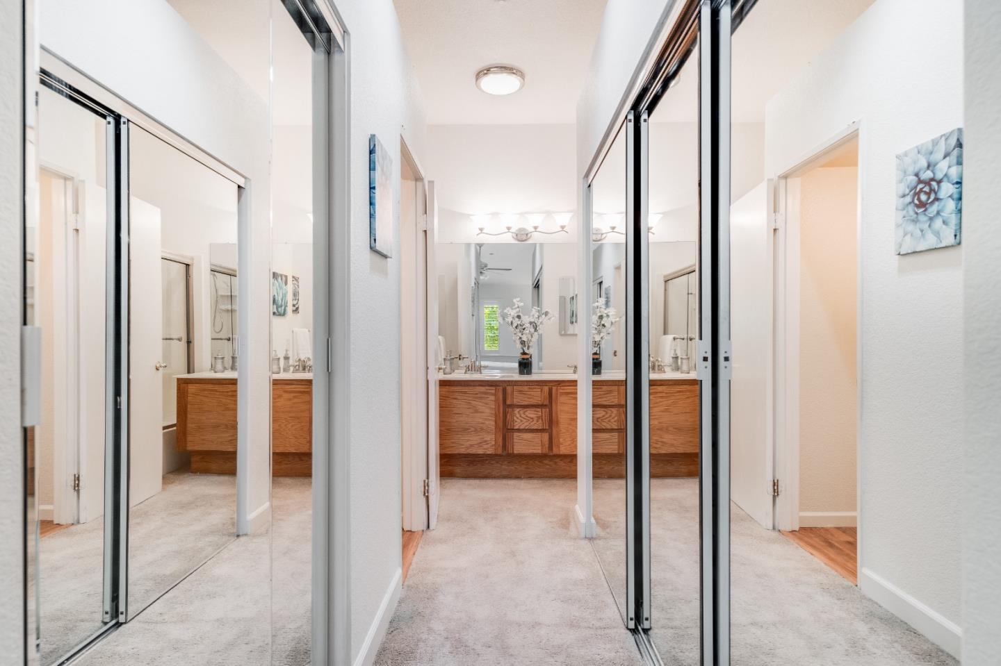 6936 Gregorich Drive, Unit E San Jose, CA 95138 - Photo 22 of 44 a view of a bathroom with shower