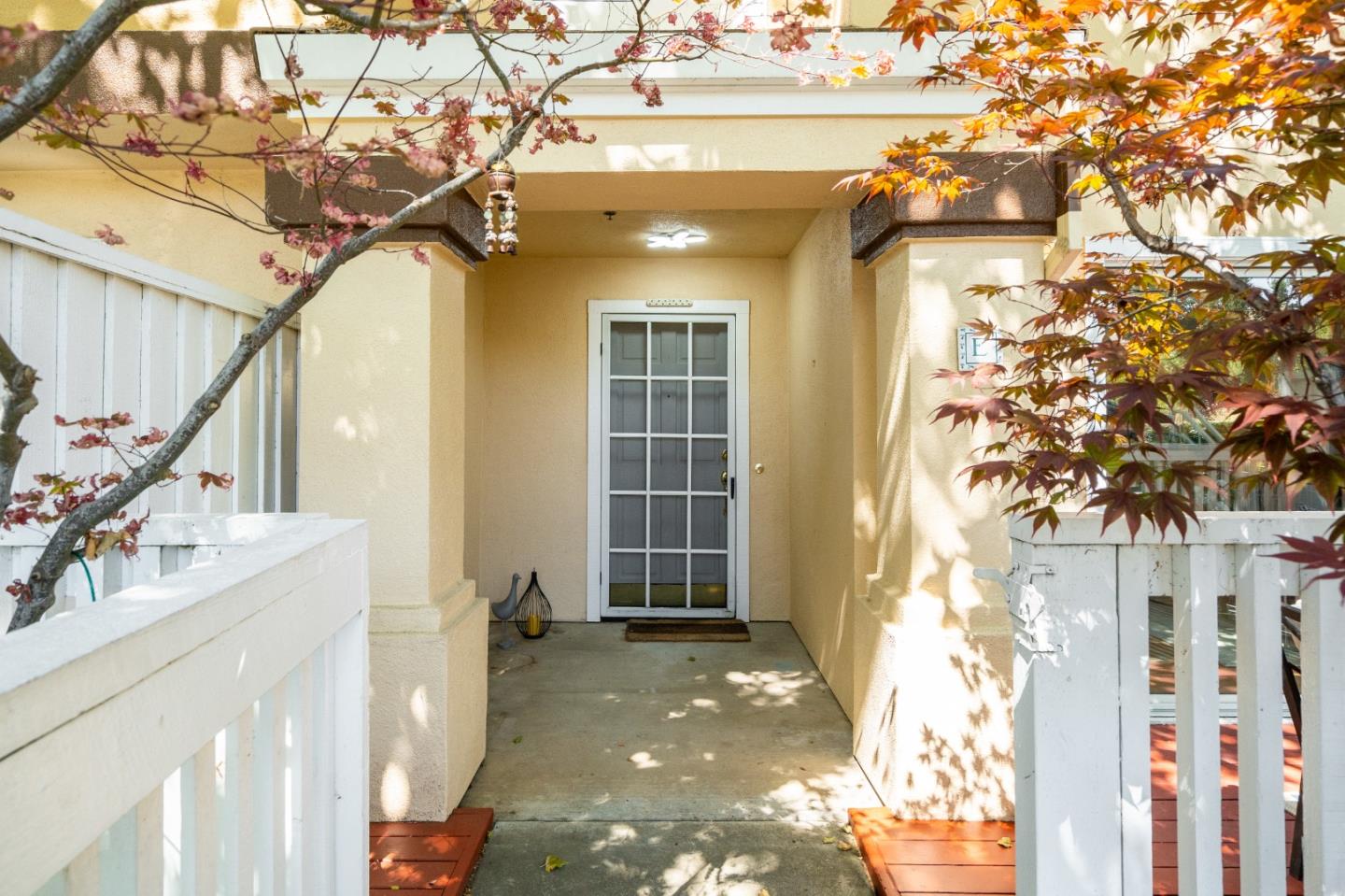 6936 Gregorich Drive, Unit E San Jose, CA 95138 - Photo 27 of 44 a view of entryway with a front door and wooden floor