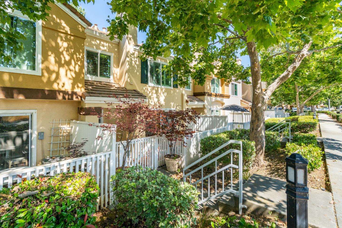6936 Gregorich Drive, Unit E San Jose, CA 95138 - Photo 28 of 44 a balcony with lots of green space and plants