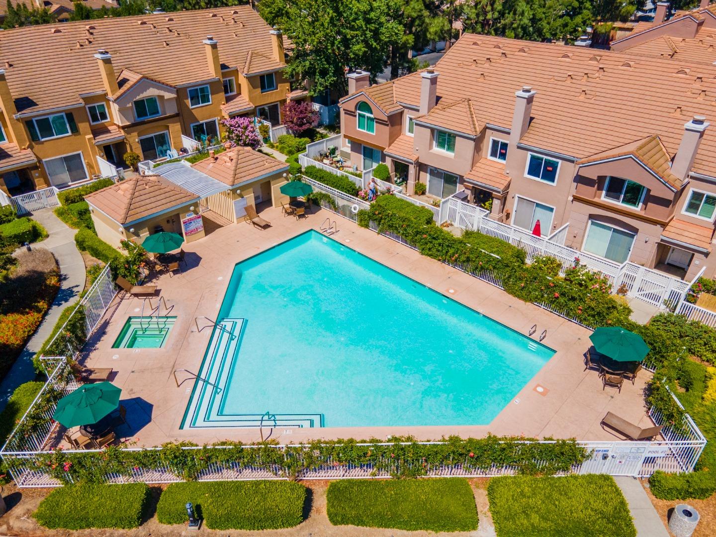 6936 Gregorich Drive, Unit E San Jose, CA 95138 - Photo 29 of 44 an aerial view of residential houses with outdoor space and street view