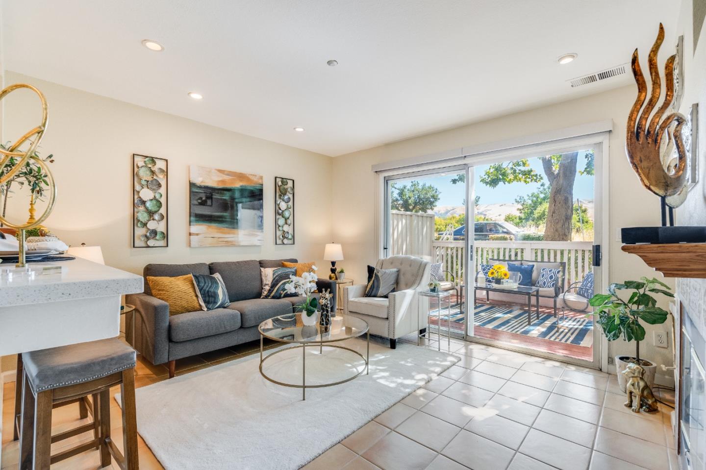 6936 Gregorich Drive, Unit E San Jose, CA 95138 - Photo 3 of 44 a living room with furniture and a large window