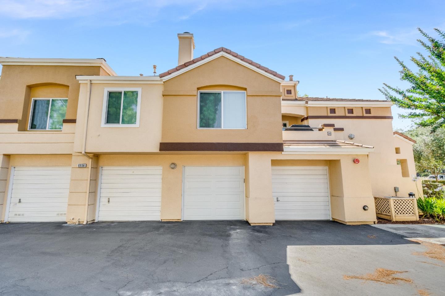 6936 Gregorich Drive, Unit E San Jose, CA 95138 - Photo 33 of 44 a view of a house with windows
