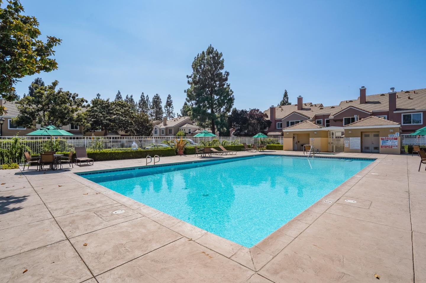 6936 Gregorich Drive, Unit E San Jose, CA 95138 - Photo 43 of 44 a view of a swimming pool and an outdoor seating