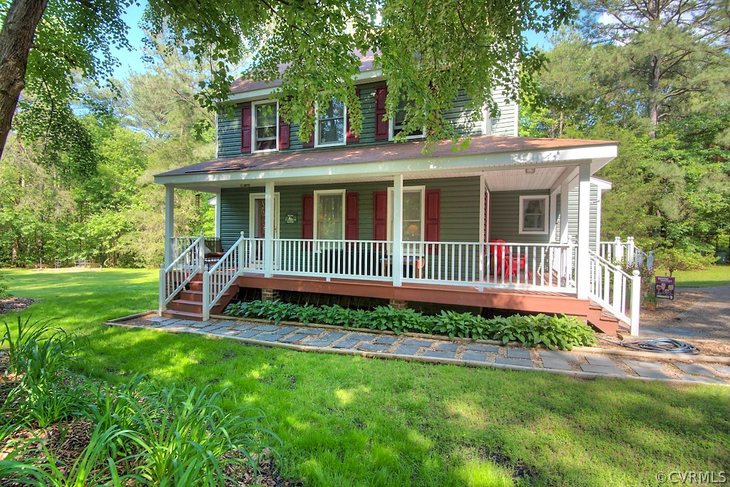 17516 Old Ridge Road Montpelier, VA 23192 - Photo 2 of 27 a view of a house with a yard and garden