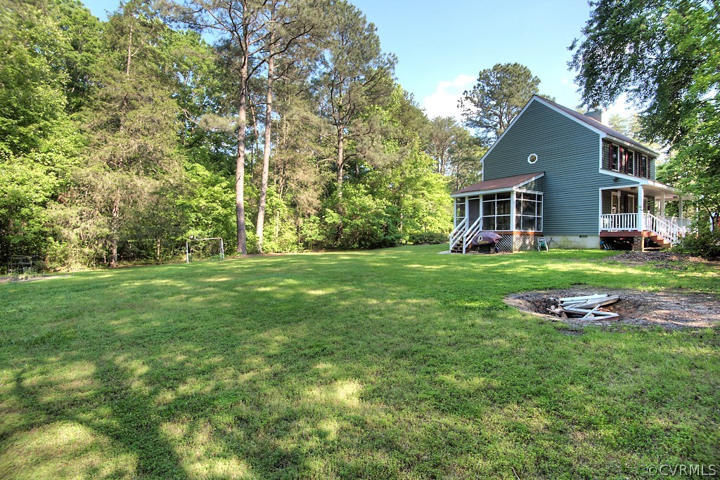 17516 Old Ridge Road Montpelier, VA 23192 - Photo 24 of 27 a view of a house with a yard and trees