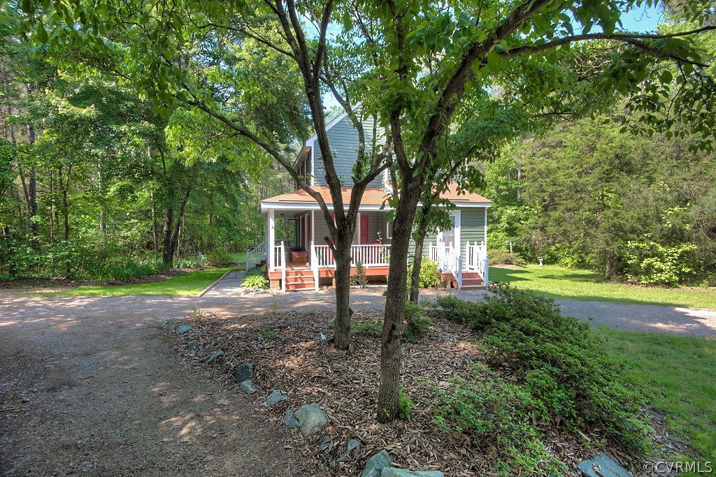 17516 Old Ridge Road Montpelier, VA 23192 - Photo 26 of 27 a view of a house with backyard and trees