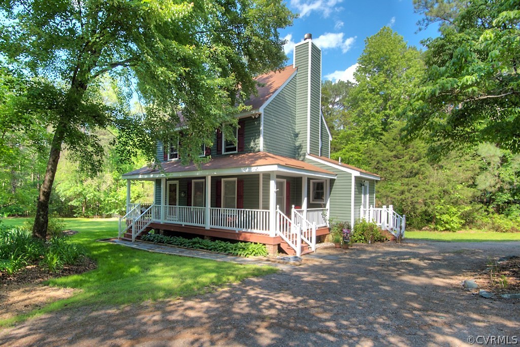 17516 Old Ridge Road Montpelier, VA 23192 - Photo 27 of 27 a view of a house with yard and a tree