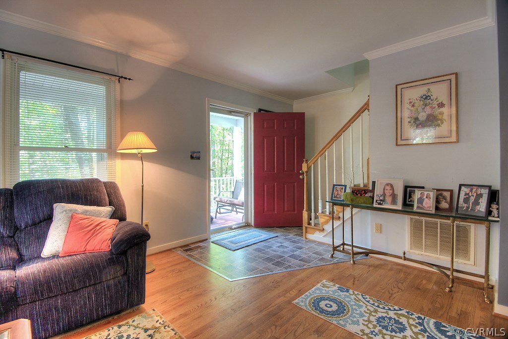 17516 Old Ridge Road Montpelier, VA 23192 - Photo 5 of 27 a living room with furniture a window and a flat screen tv