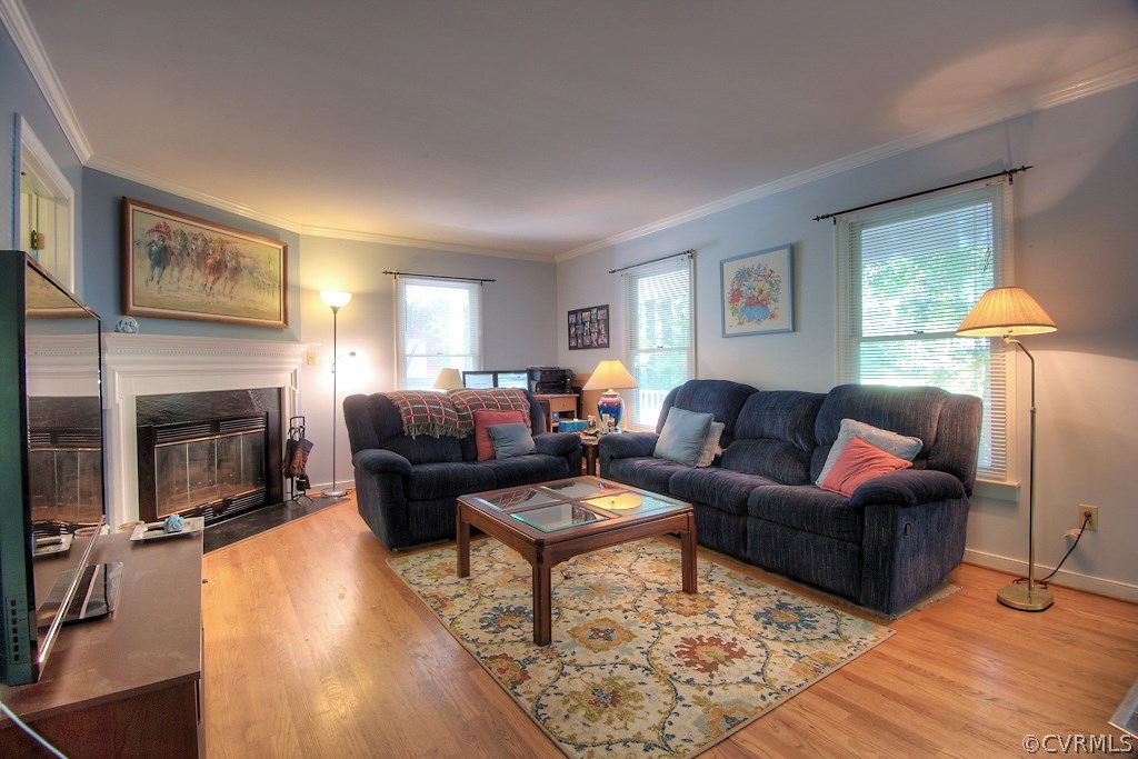 17516 Old Ridge Road Montpelier, VA 23192 - Photo 6 of 27 a living room with furniture a fireplace and a table