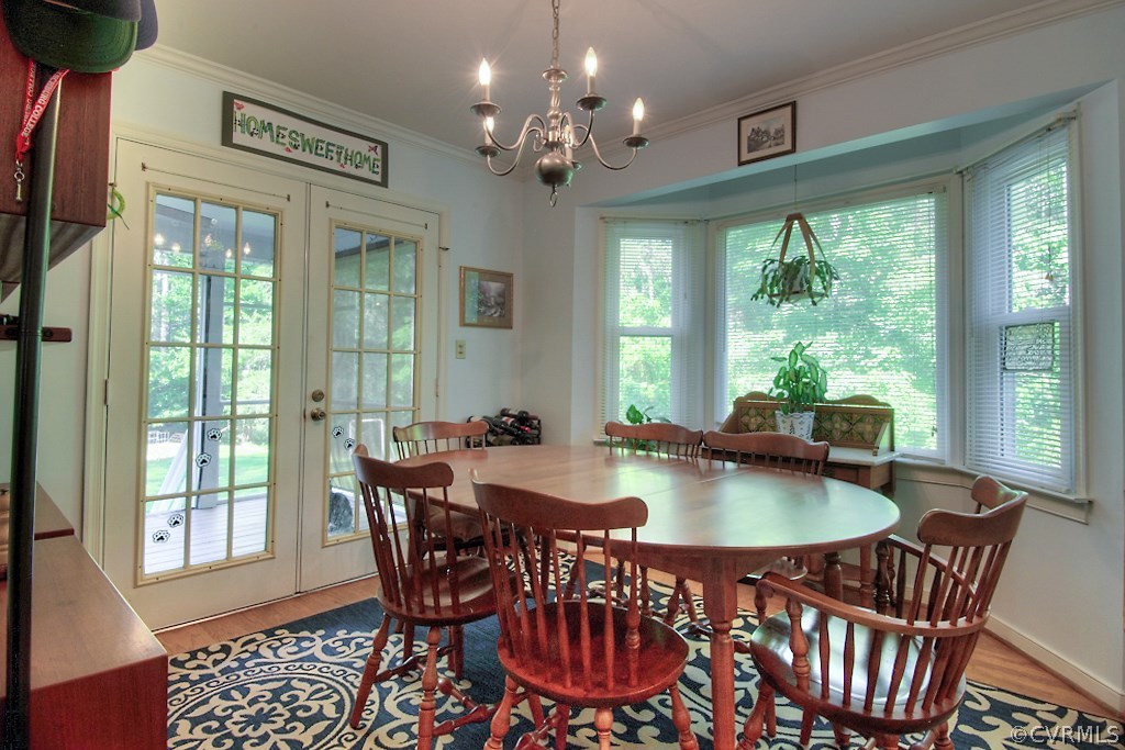 17516 Old Ridge Road Montpelier, VA 23192 - Photo 9 of 27 a dining room with furniture a chandelier and window