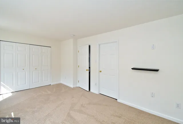 a view of a park with swings and slides