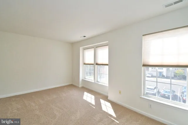 a view of a yard and front view of a house