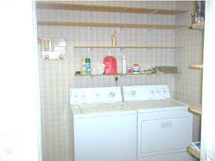 1040 Palisade Road Pensacola, FL 32504 - Photo 8 of 12 Large utility room that leads to the third bathroom