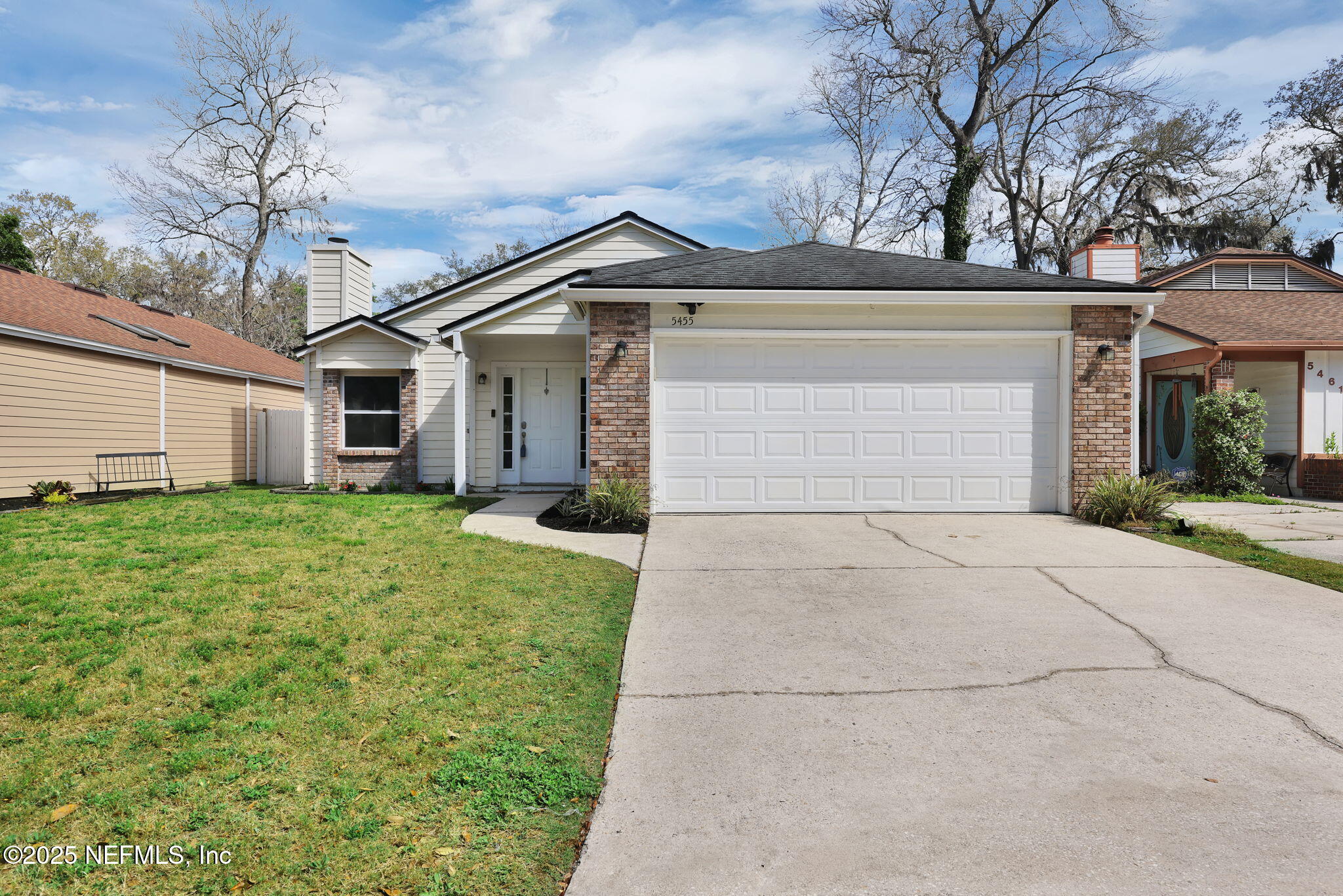 front view of house with a yard