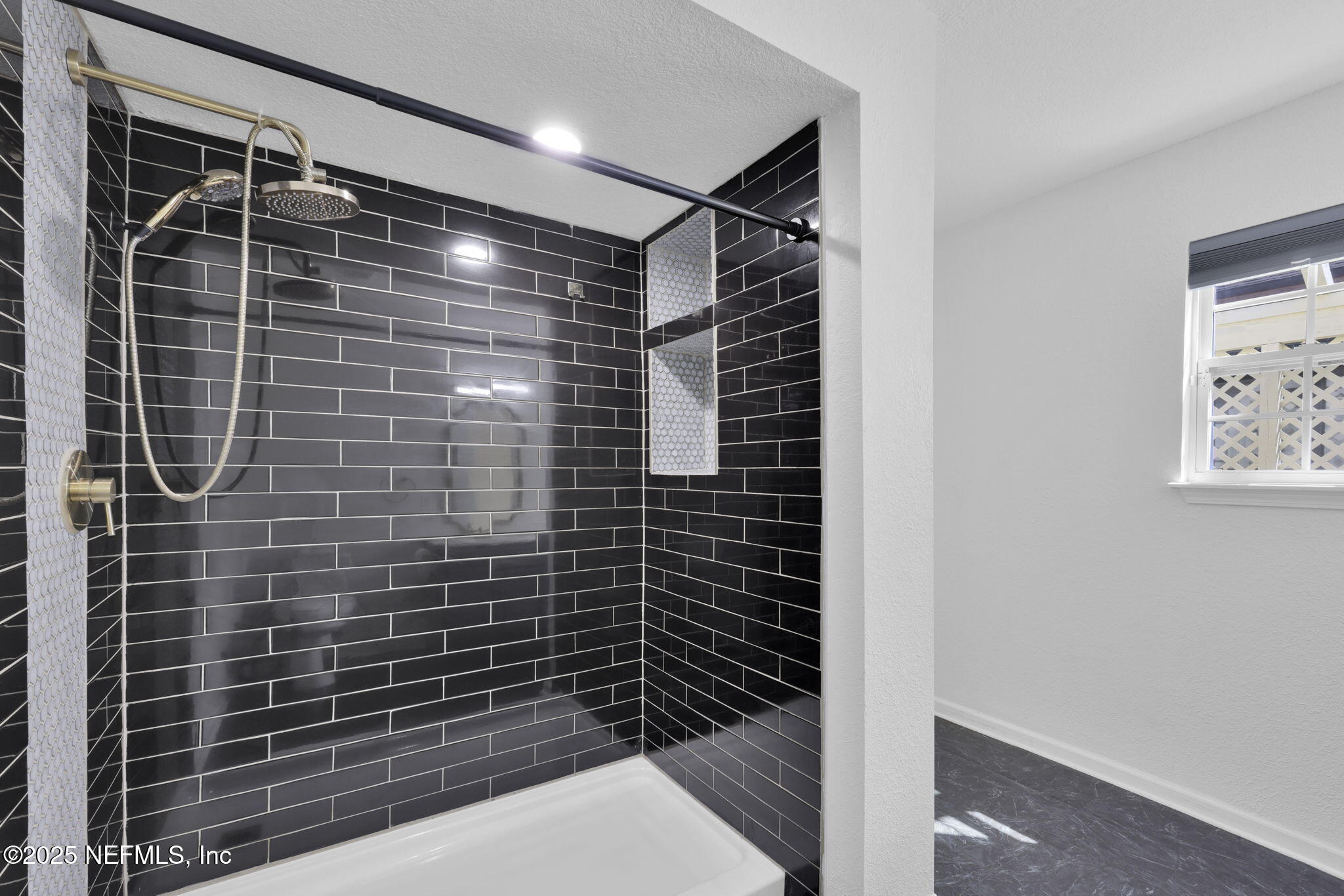 5455 Spring Brook Road Jacksonville, FL 32277 - Photo 16 of 21 a bathroom with a shower