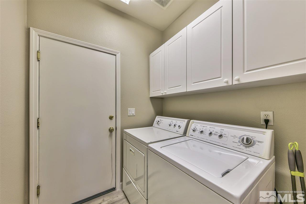 10680 Arbor Way Reno, NV 89521 - Photo 13 of 16 a utility room with dryer and washer