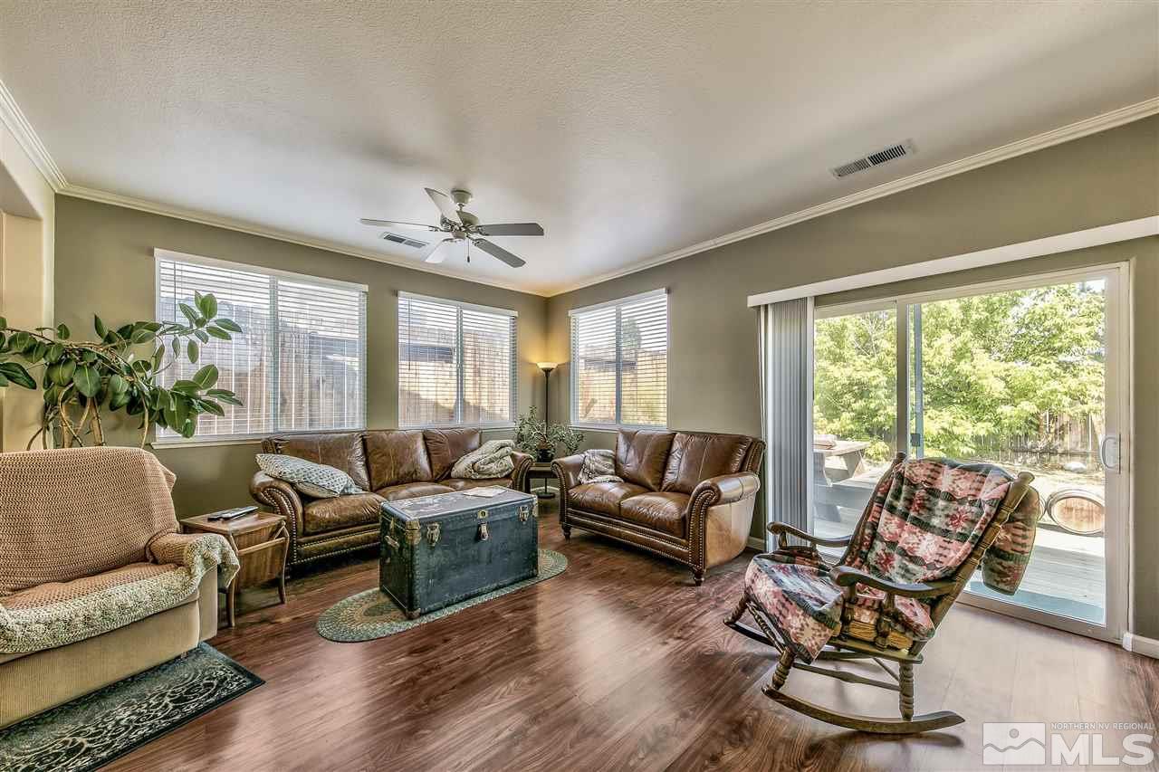 10680 Arbor Way Reno, NV 89521 - Photo 3 of 16 a living room with furniture and a large window