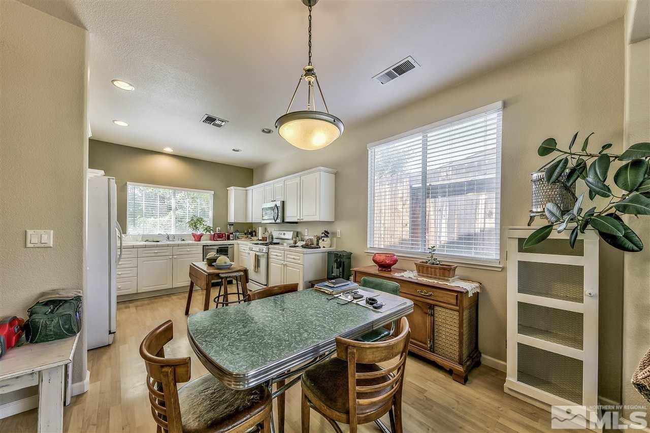10680 Arbor Way Reno, NV 89521 - Photo 7 of 16 a dining room with furniture and window