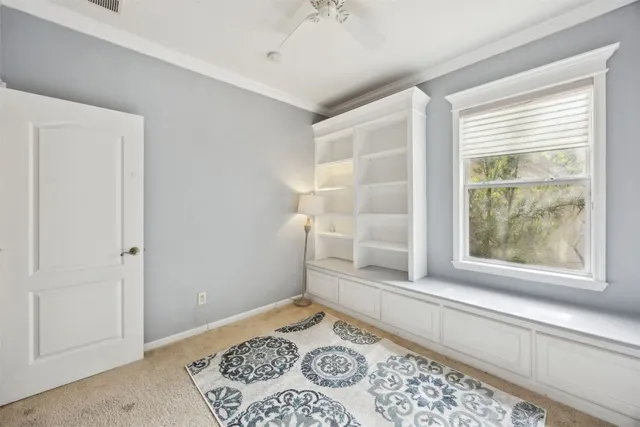 a bathroom with a sink mirror vanity and toilet