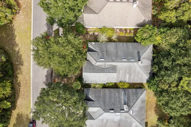 a view of a chairs and table in the patio