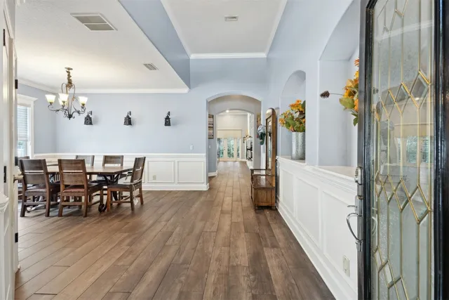 a view of entryway with wooden floor