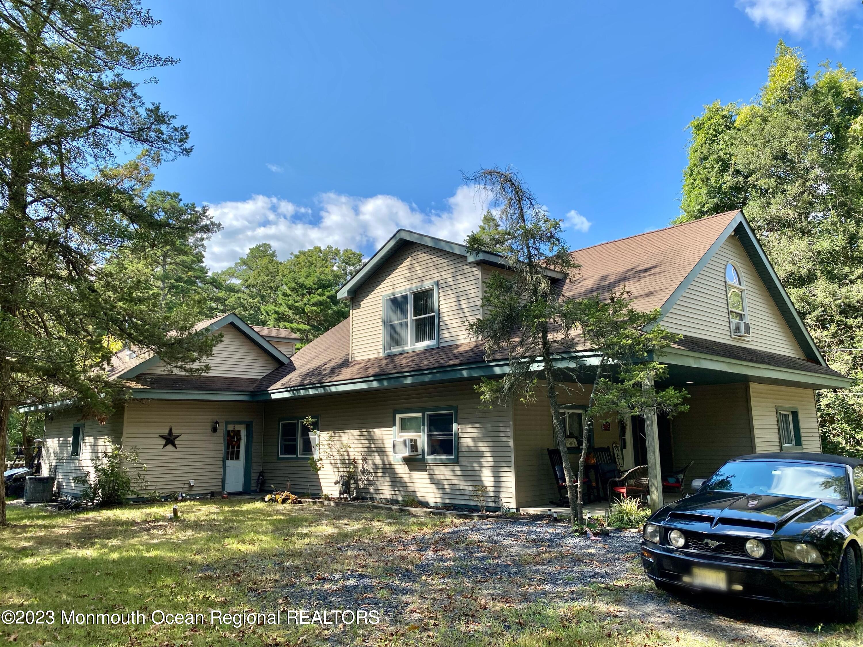 113 Maple Avenue Tuckerton, NJ 08087 - Photo 1 of 69 a view of a house with backyard porch and sitting area