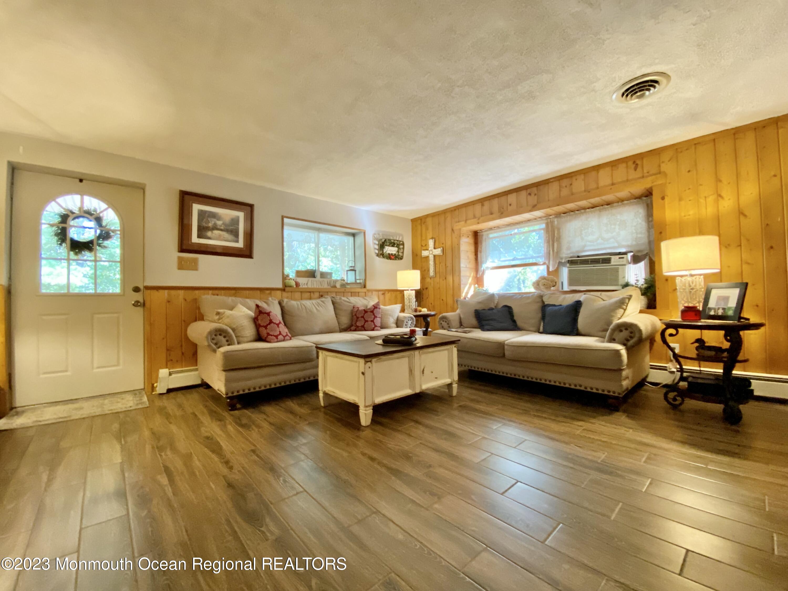 113 Maple Avenue Tuckerton, NJ 08087 - Photo 11 of 69 a living room with furniture and a large window