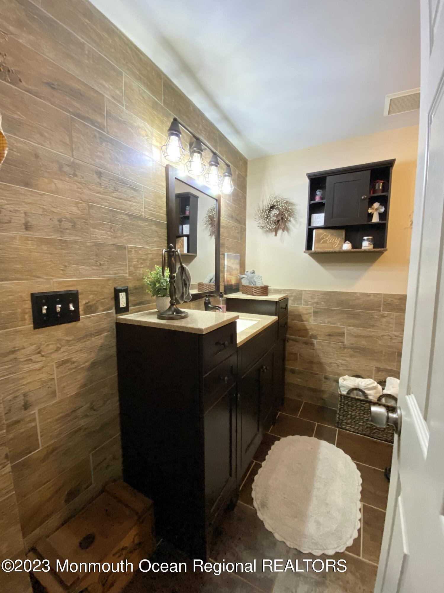 113 Maple Avenue Tuckerton, NJ 08087 - Photo 12 of 69 a bathroom with a sink toilet and mirror