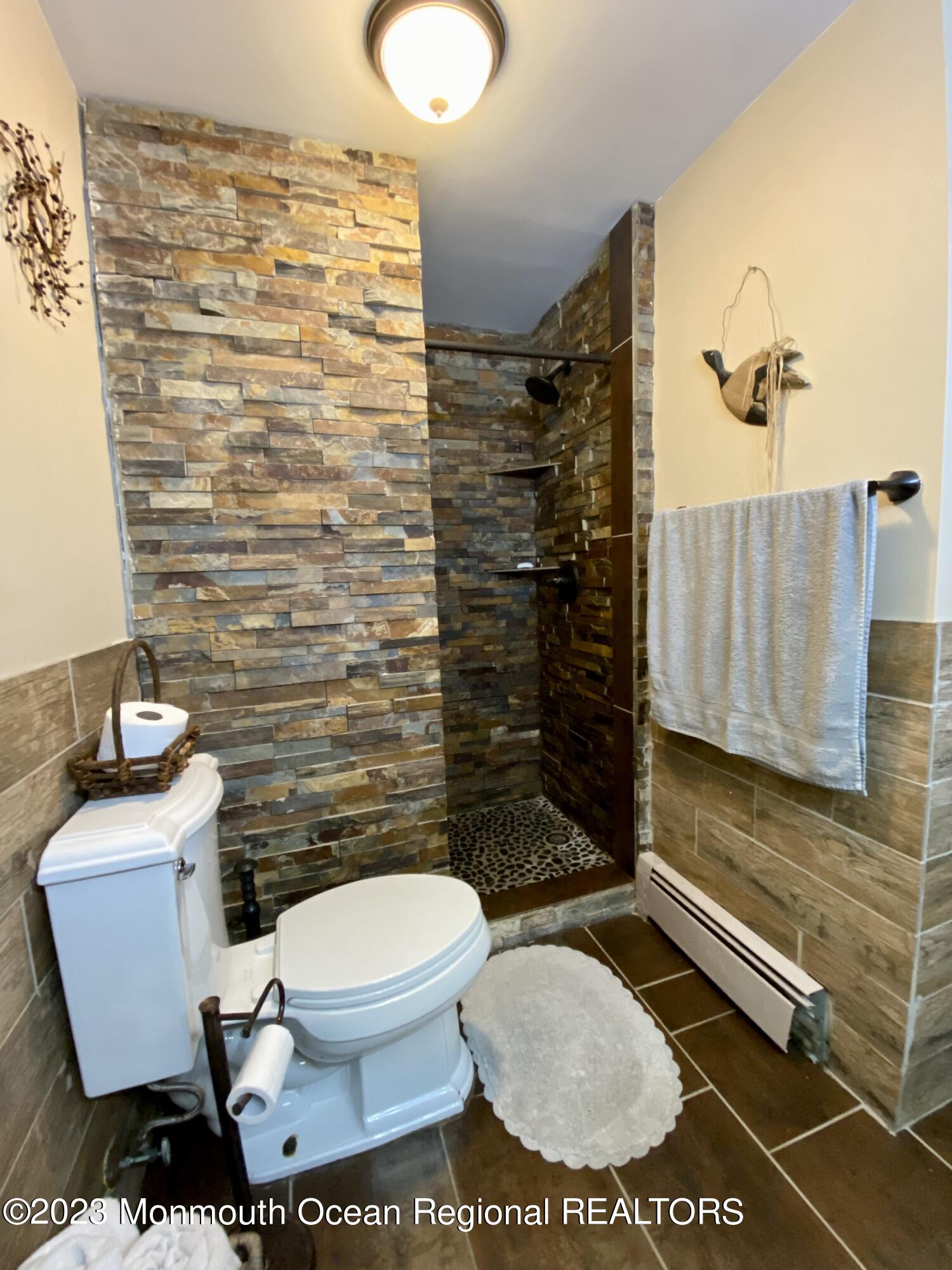 113 Maple Avenue Tuckerton, NJ 08087 - Photo 13 of 69 a bathroom with a toilet and a shower