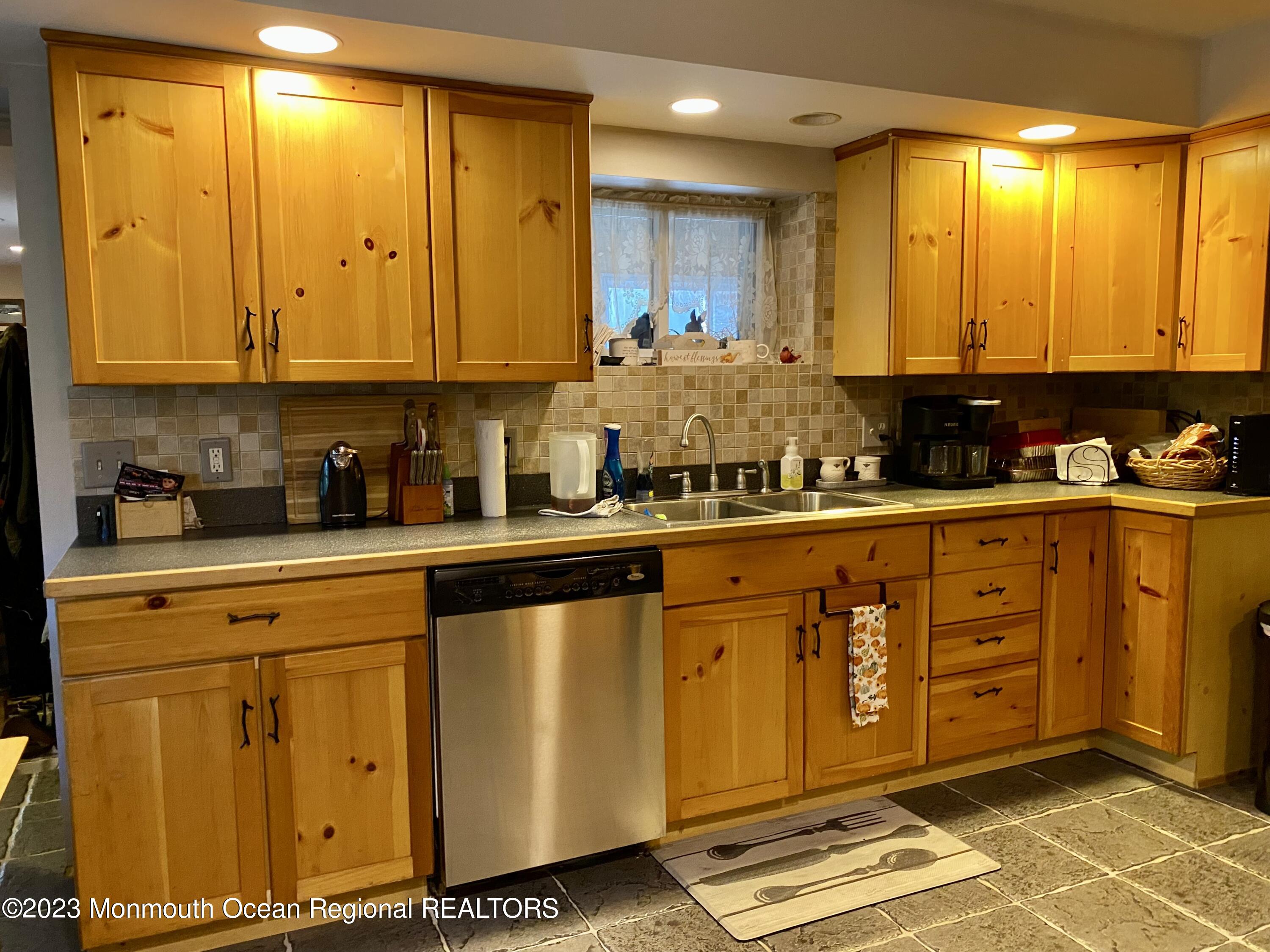 113 Maple Avenue Tuckerton, NJ 08087 - Photo 20 of 69 a kitchen with stainless steel appliances granite countertop a sink and cabinets