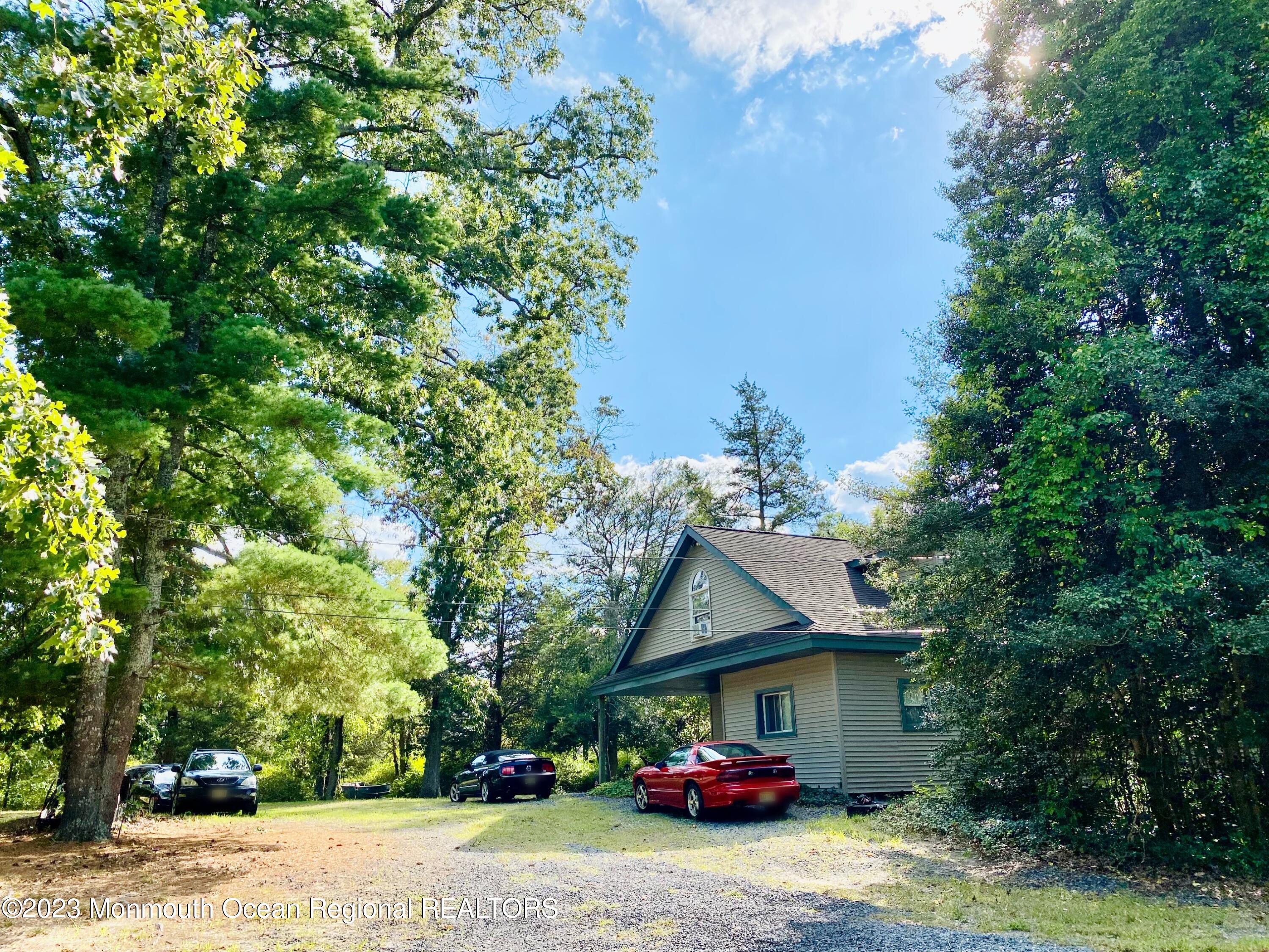 113 Maple Avenue Tuckerton, NJ 08087 - Photo 3 of 69 a view of a house with street and trees