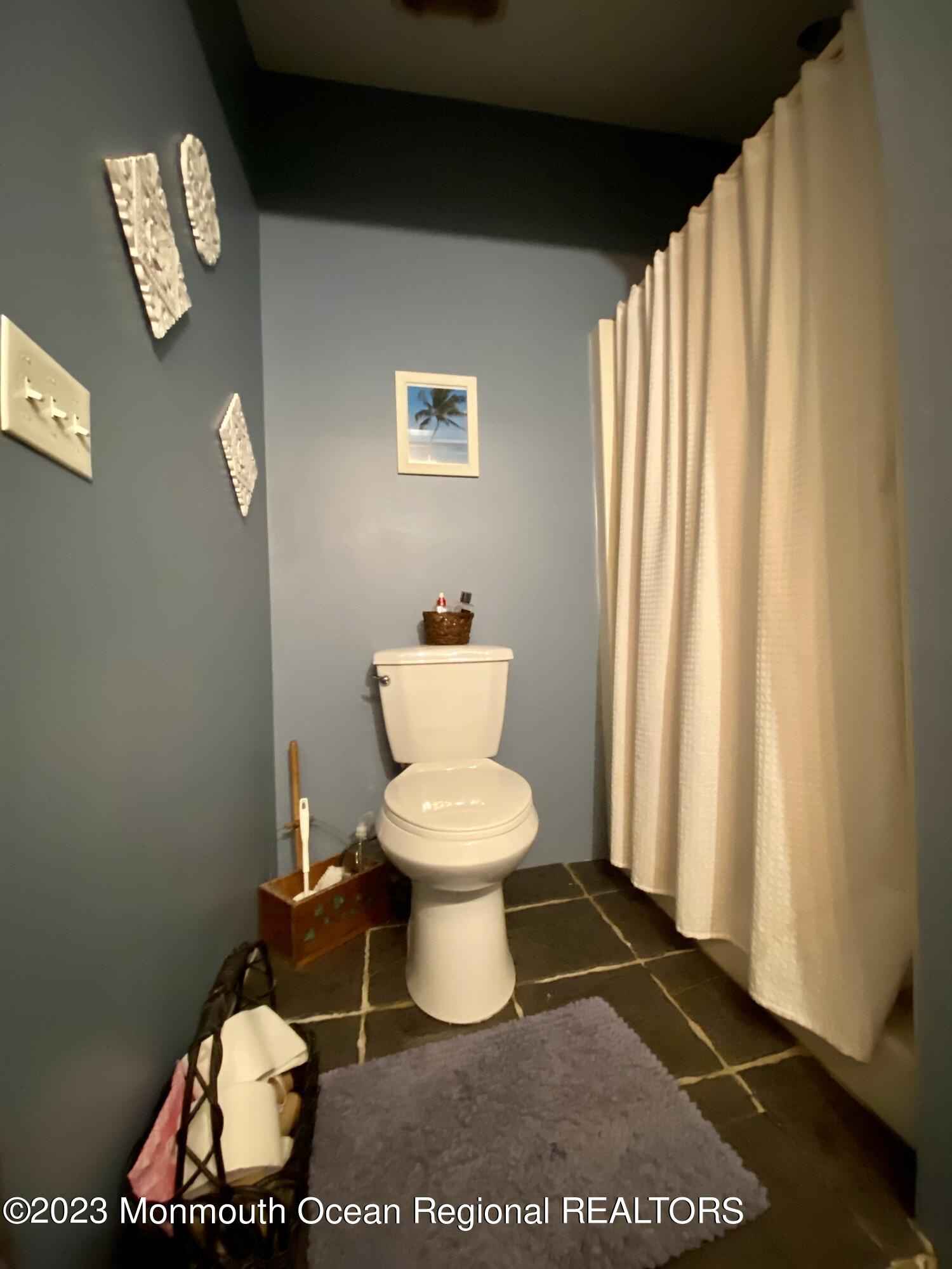 113 Maple Avenue Tuckerton, NJ 08087 - Photo 33 of 69 a bathroom with a toilet and a sink