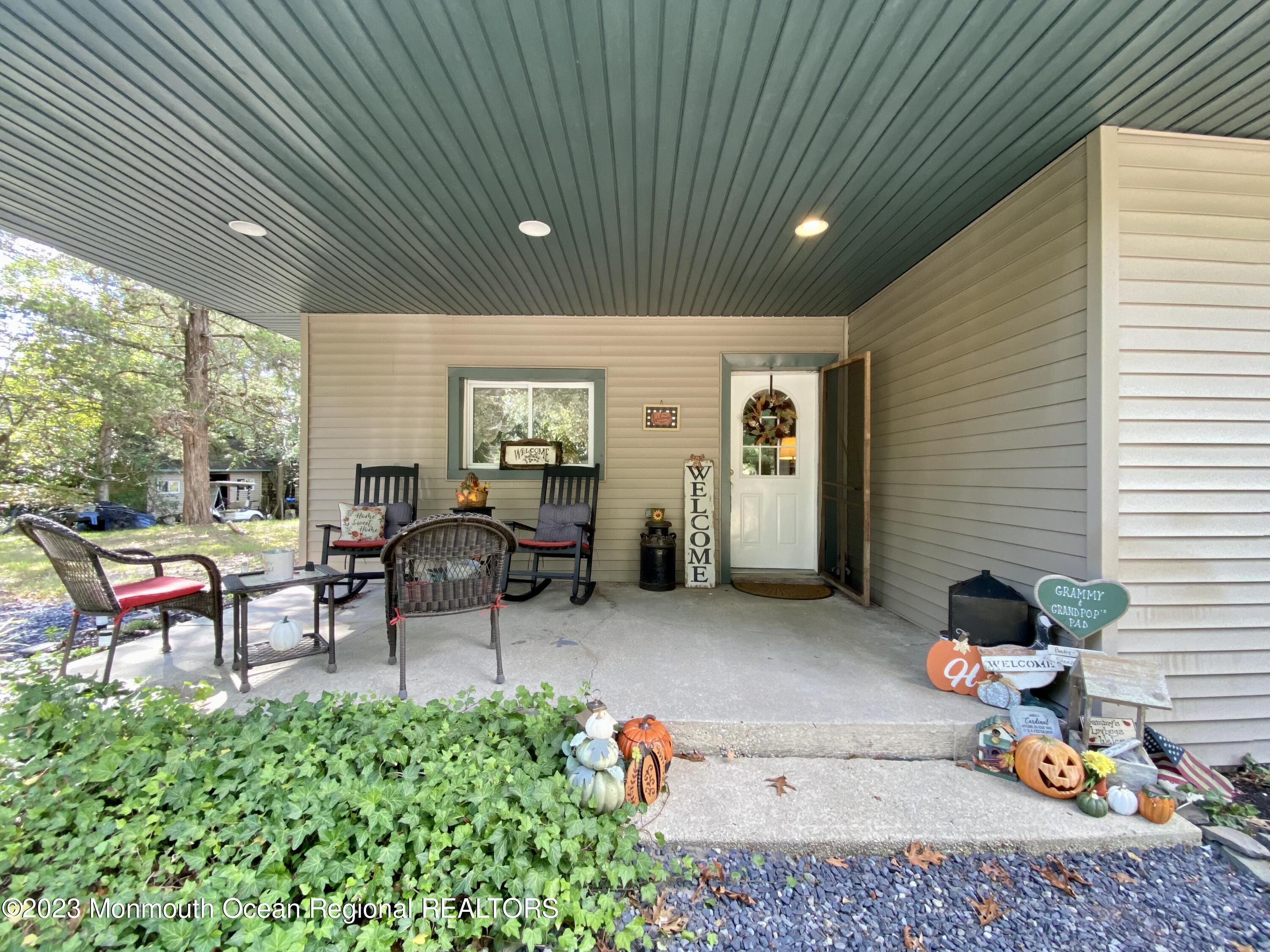113 Maple Avenue Tuckerton, NJ 08087 - Photo 4 of 69 a backyard of a house with seating space