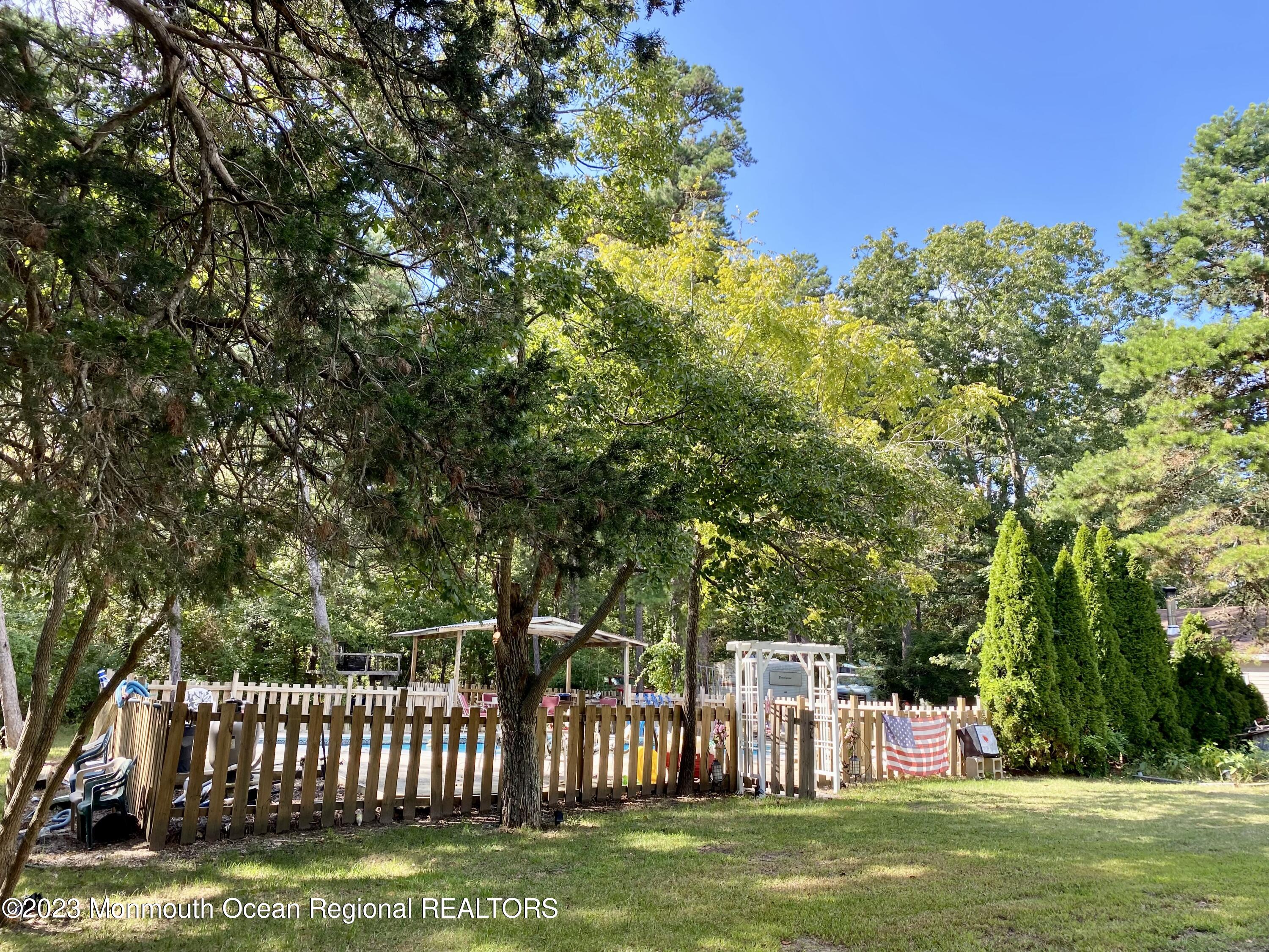 113 Maple Avenue Tuckerton, NJ 08087 - Photo 49 of 69 a view of a deck with a big yard