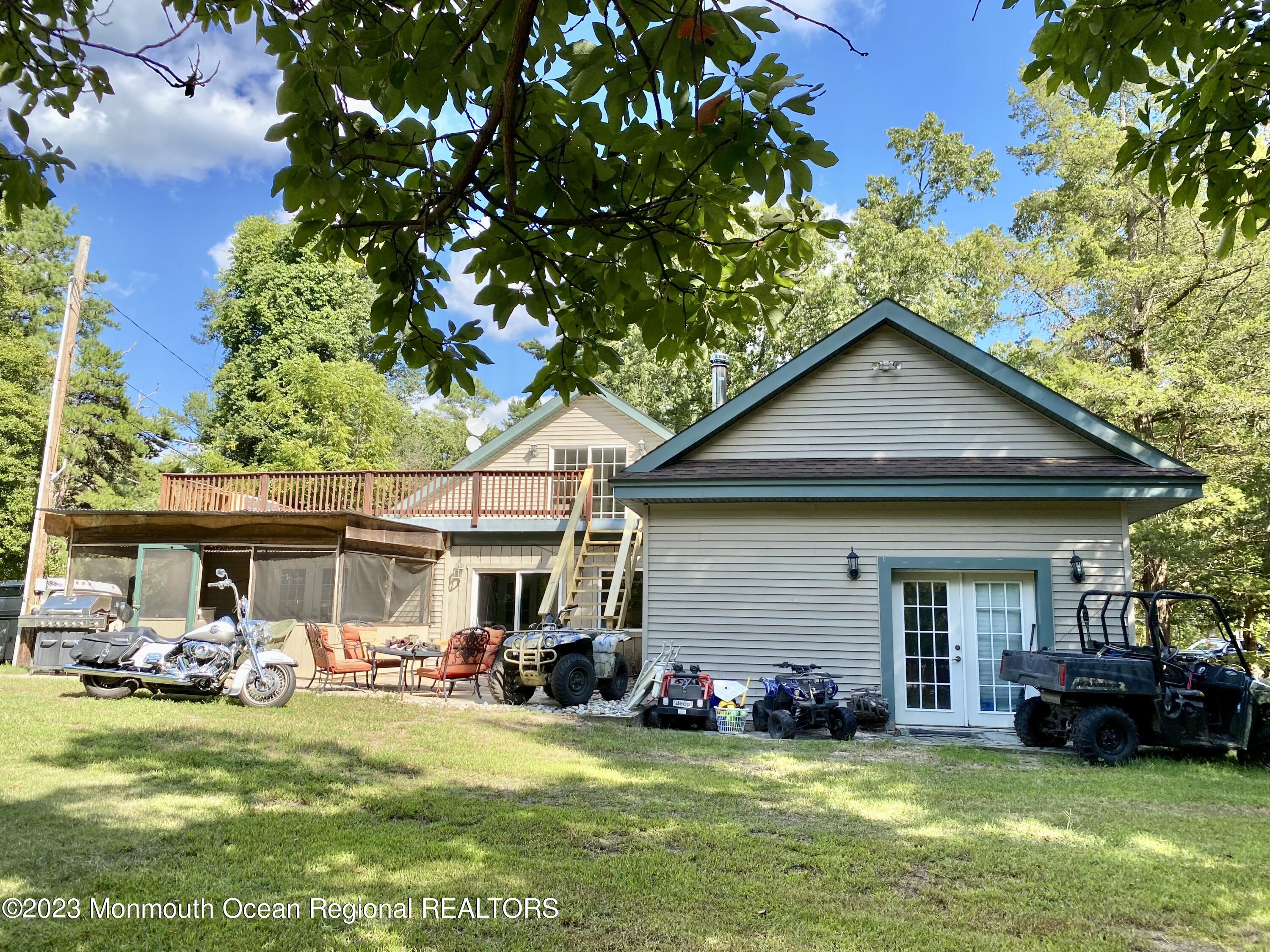 113 Maple Avenue Tuckerton, NJ 08087 - Photo 5 of 69 a view of a house with a yard porch and sitting area